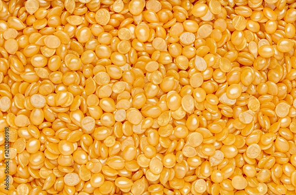 Obraz Macro background photography of cosmetics hard wax beads, waxing, hair removal, depilation, spa salon, beauty procedure, advertisement