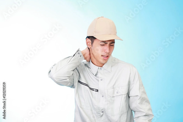 Fototapeta 疲れた表情の労働者