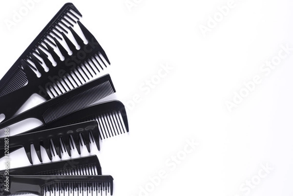 Fototapeta Set of black plastic combs on white background