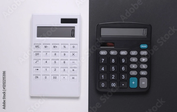 Obraz Two calculators on white black background