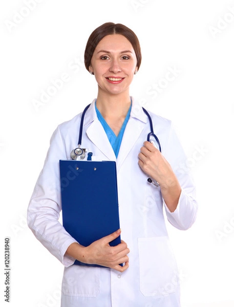 Fototapeta Happy smiling young beautiful female doctor showing blank area for sign or copyspace, isolated over white background