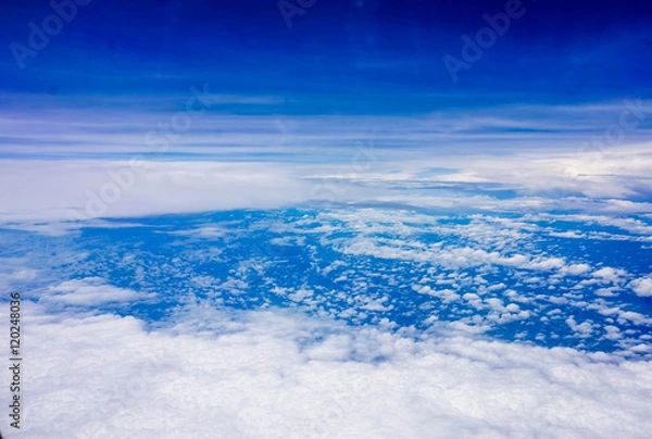 Obraz blue sky high view from airplane window clouds shapes