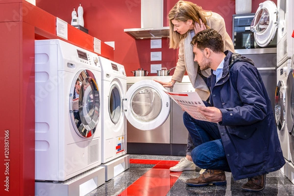 Obraz Couple Choosing Washing Machine At Hypermarket