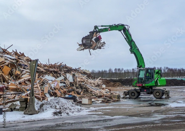 Fototapeta Sorting work at a recycling center