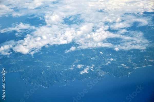 Fototapeta clouds view and City of Japan from the window of an airplane fly