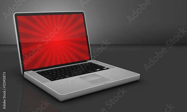 Fototapeta Glossy Steel Laptop on Gray Background with Burst Graphic on Scr