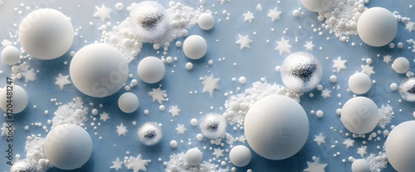 Fototapeta Elegant Silver Christmas Ornaments on Snow with Blue Bokeh Background