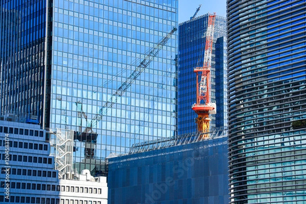 Obraz 建設中の高層ビルと都市開発の風景　開発イメージ