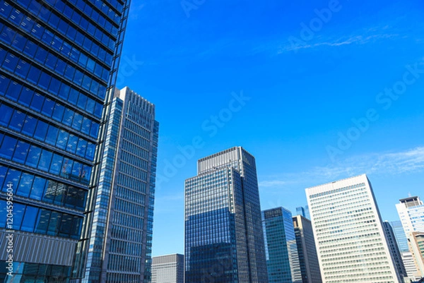 Obraz 高層ビルを下から見上げたオフィス街の都市風景　ビジネスイメージ