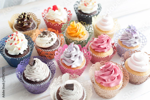 Fototapeta Many different colored delicious cupcakes