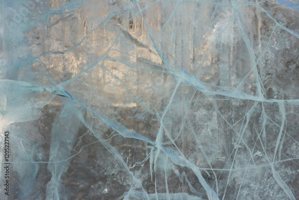Fototapeta frozen natural translucent glowing glacier crystals, macrostructure of transparent ice close-up, iceberg ice
