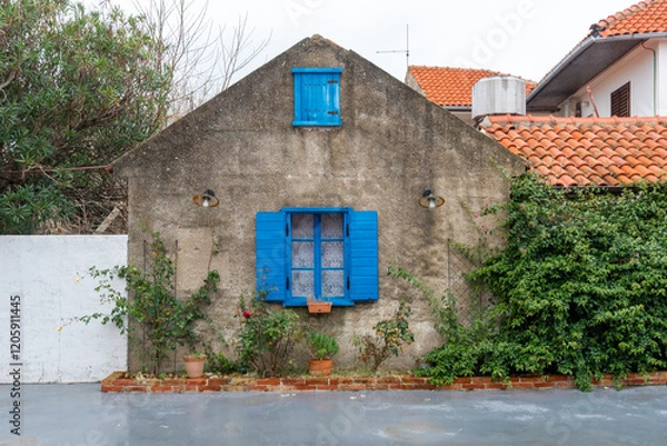 Obraz Picturesque view with blue window in Nin. Nin is a small town located near Zadar, dating back to roman times.