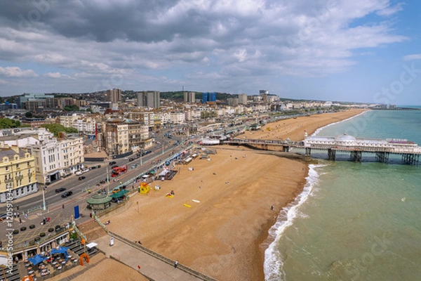 Fototapeta The drone aerial view of Brighton Pier and the beach of Brighton. The Brighton Palace Pier, is a pleasure pier in Brighton, England, located in the city centre opposite the Old Steine.