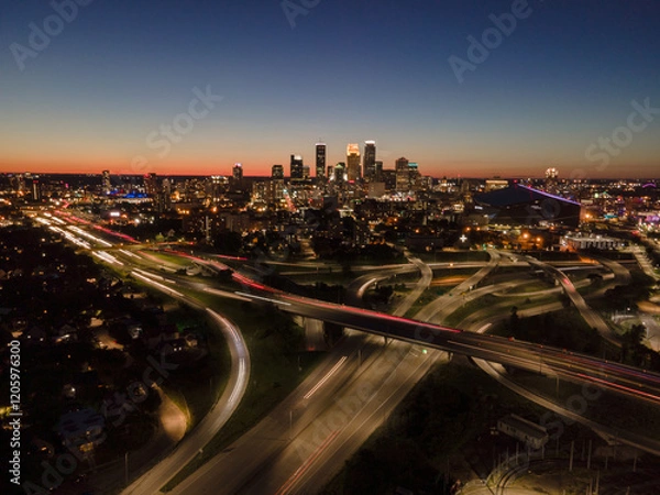 Obraz Minneapolis skyline at dusk with light trails