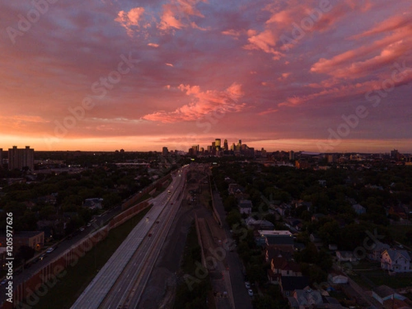 Obraz Aerial view of Minneapolis, Minnesota, at sunset with a dramatic sky