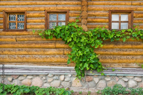 Obraz windows in wooden frames on a wall