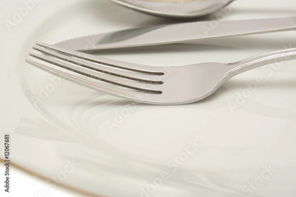 Fototapeta Empty plate with knife and fork