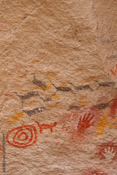 Fototapeta Vertical Image of Rock ledge on Rio Pinturas where famous rock paintings of handprints and animals are located. Location: Cueva de las Manos, UNESCO World Heritage Site, Patagonia, Argentina