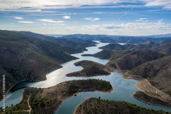 Fototapeta Amazing abstract landscape of Sabor lake, Tras os Montes  Portugal. Drone vision, aerial view of Serpente do Medal, Sabor River, tourist attraction and travel destination in Northern Portugal.