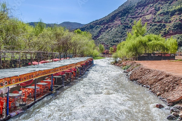 Obraz Ourika valley mountain river with rocks at front and hills at back.