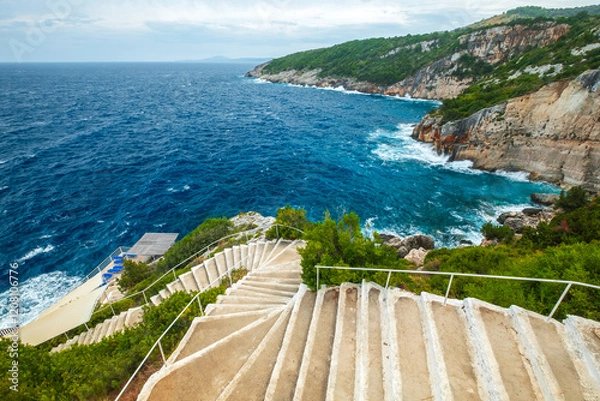 Obraz Winding stairs lead to a popular bathing spot on the island of Zakynthos