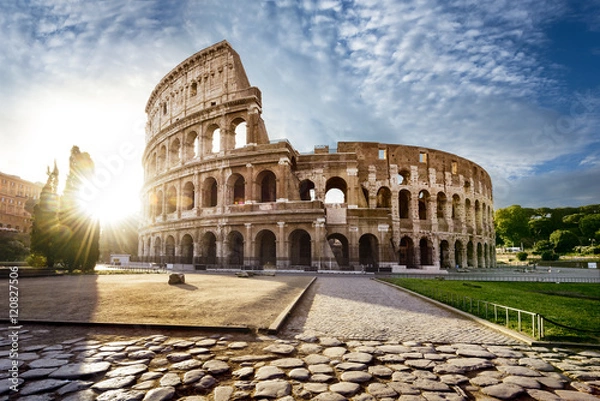 Obraz Colosseum in Rome and morning sun, Italy