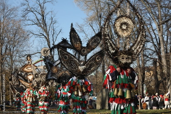 Obraz The Surva masquerade games festival in Sofia, Bulgaria. People called Kukeri parade in masks and ritual costumes, perform ritual dances to drive away evil spirits in Sofia, Bulgaria