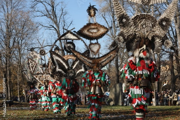 Obraz The Surva masquerade games festival in Sofia, Bulgaria. People called Kukeri parade in masks and ritual costumes, perform ritual dances to drive away evil spirits in Sofia, Bulgaria