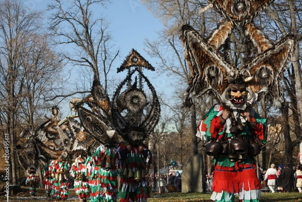 Obraz The Surva masquerade games festival in Sofia, Bulgaria. People called Kukeri parade in masks and ritual costumes, perform ritual dances to drive away evil spirits in Sofia, Bulgaria