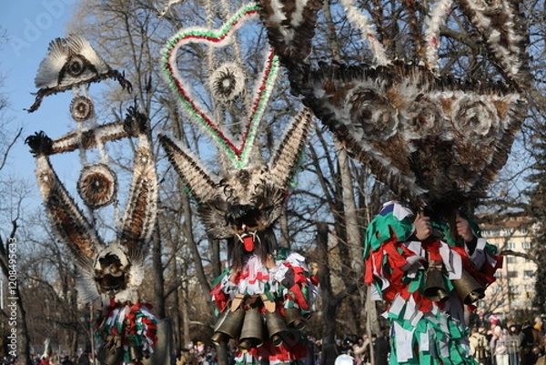 Obraz The Surva masquerade games festival in Sofia, Bulgaria. People called Kukeri parade in masks and ritual costumes, perform ritual dances to drive away evil spirits in Sofia, Bulgaria