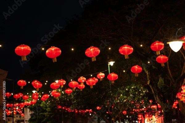 Fototapeta Lanterns of Chinese New Year in the night. Abstract Bokeh background