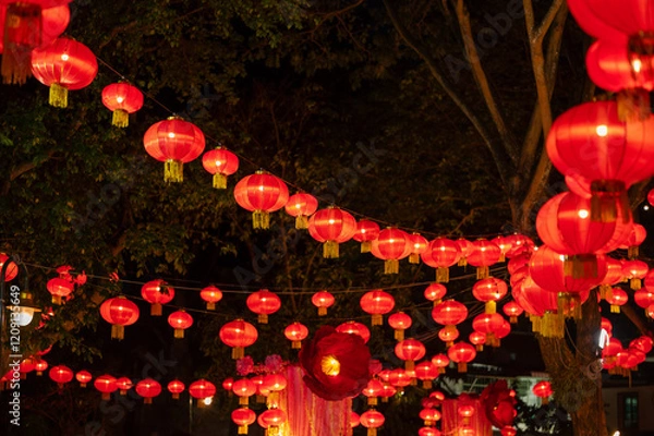 Fototapeta Lanterns of Chinese New Year in the night. Abstract Bokeh background
