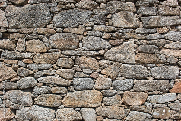 Obraz Hintergrund – spanische Natursteinmauer