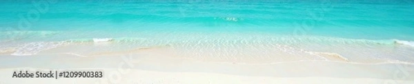 Fototapeta Fine white sand, turquoise water rolls softly , background, serene