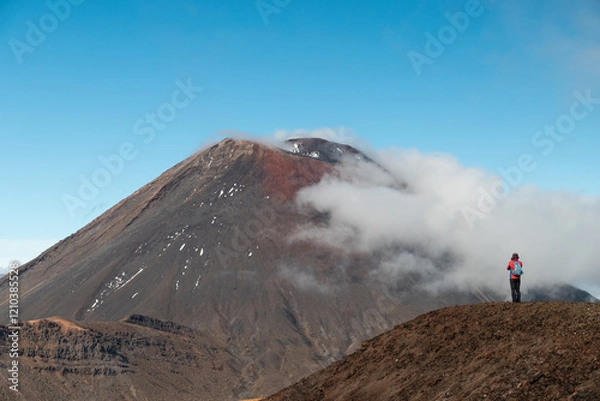 Obraz Female hiker enjoying the spectacular view of Mount Ngauruhoe as spotted during the Tongariro Crossing (North Island, New Zealand) 