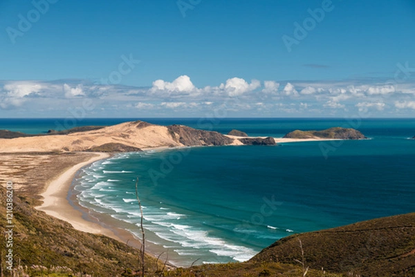 Obraz View of coastline near Cape Reinga Lighthouse (New Zealand's northern most point) with clear water and blue sky (North Island, New Zealand)