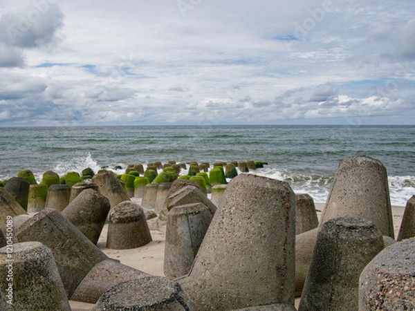 Fototapeta Hoernumer Odde with tetrapods as bank reinforcement, Sylt