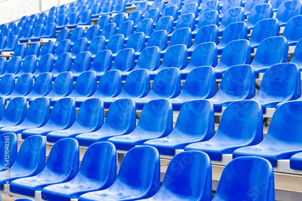 Fototapeta Empty blue stadium seats
