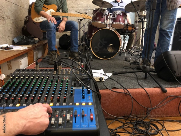 Obraz guy on soundboard while the band warms up