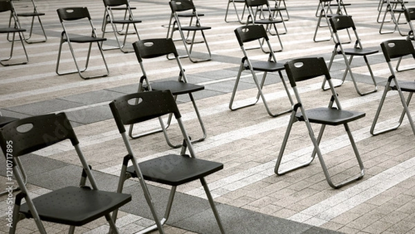 Obraz Folding chairs lined up at the event venue in the square