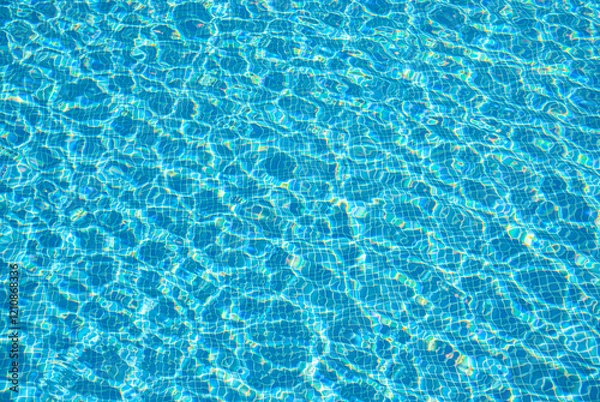 Fototapeta Sun reflections on the water surface of a swimming pool