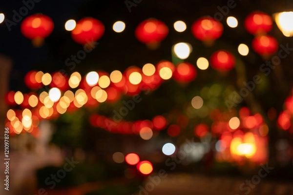 Fototapeta Lanterns of Chinese New Year in the night. Abstract Bokeh background