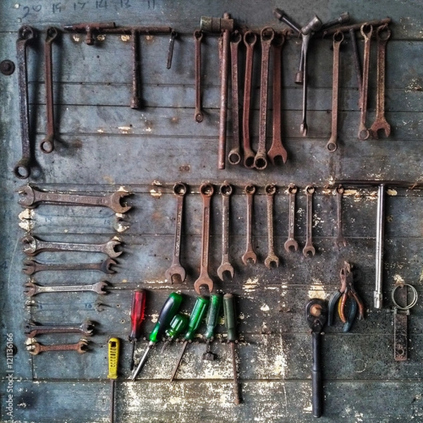 Fototapeta Workshop scene. Tools on the table and board.