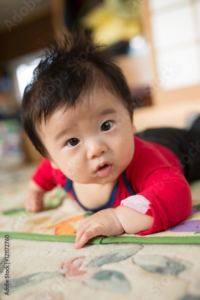 Fototapeta 着替える赤ちゃん