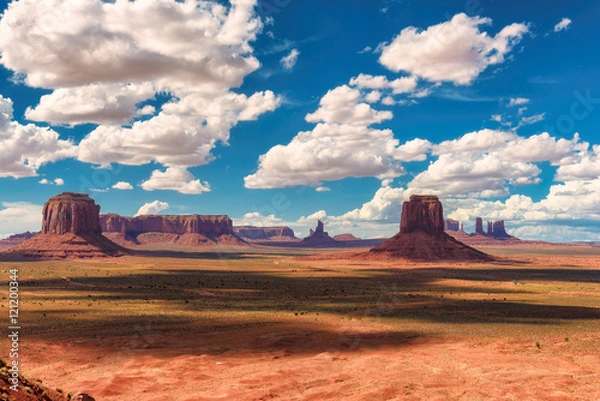 Fototapeta Beautiful clouds over Monument Valley. Navajo Reservation in the U.S. Red Desert