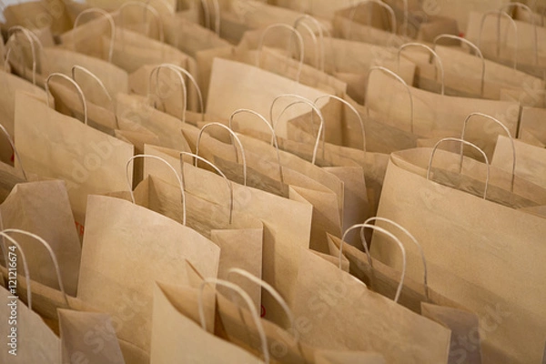 Obraz Brown paper bags in rows