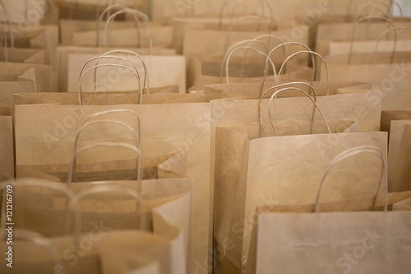 Obraz Brown paper bags in rows