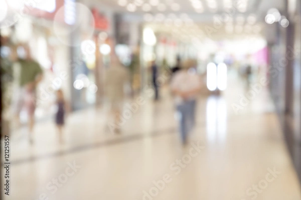 Fototapeta Blur store with bokeh background. Silhouettes of Business People