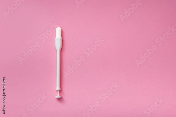 Fototapeta Vaginal suppositories on a pink background. Caring for women's health. Close-up. Flat lay. Place for text