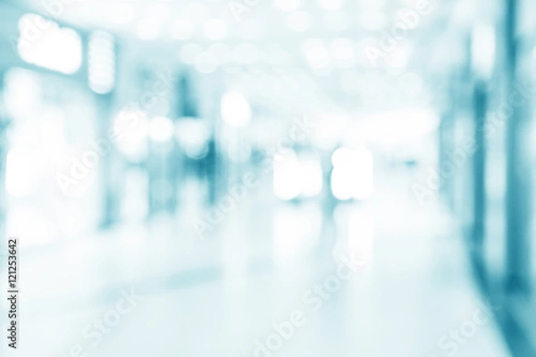 Fototapeta abstract defocused blurred background, empty business corridor o